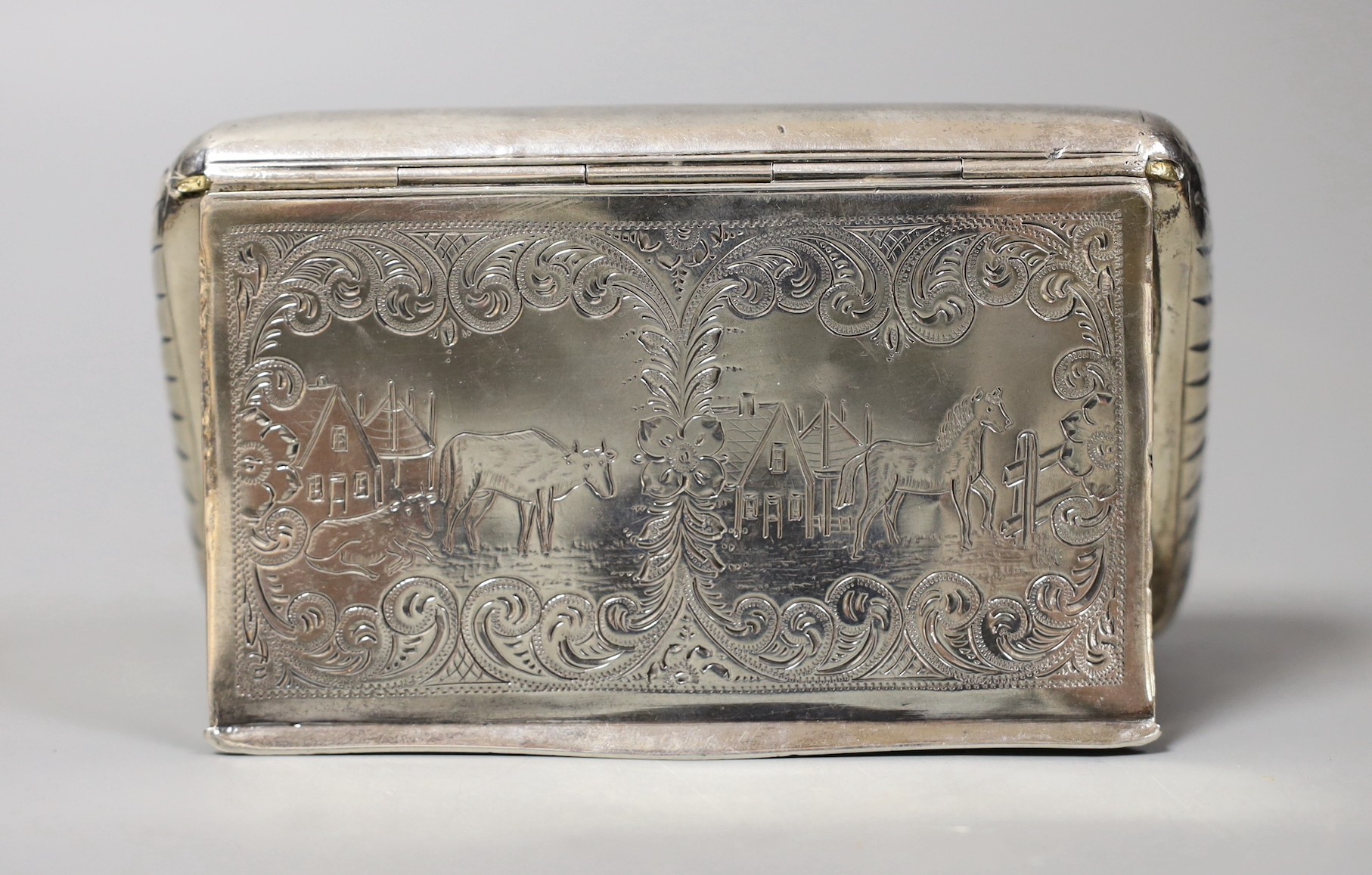 A 19th century Dutch 833 standard white metal tobacco box, engraved with animals in farmyard scene, 13.1cm, 159 grams.